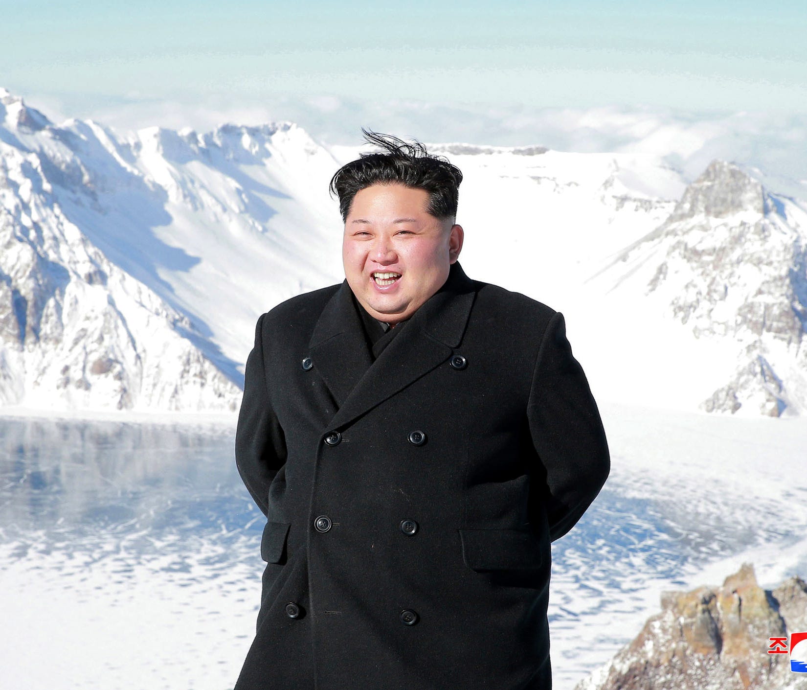 North Korean leader Kim Jong Un smiles as Kim climbed Mt. Paektu, Ryanggang Province, North Korea.