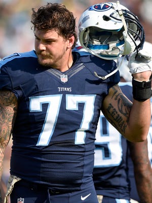 Titans tackle Taylor Lewan (77) is ejected from the game in the first quarter at Nissan Stadium Sunday, Nov. 13, 2016, in Nashville, Tenn.
