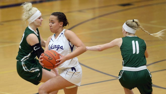 North Kitsap senior Olivia Selembo overcame a broken ankle to help lead the Vikings to the Class 2A state tournament. Selembo is the Kitsap Sun girls basketball player of the year for 2018.