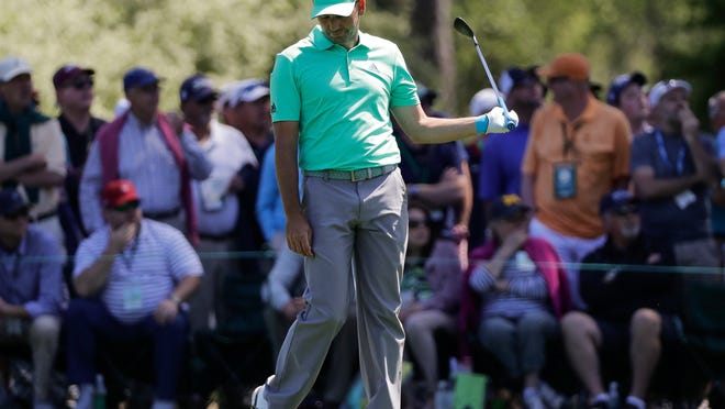 Sergio Garcia, of Spain, reacts on the 15th hole during the first round at the Masters golf tournament Thursday, April 5, 2018, in Augusta, Ga. Garcia shot an 8-over 13 on the hole. (AP Photo/David J. Phillip)
