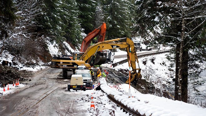 Crews worked through wintry conditions to repair Highway 22 following the earlier fatal crash.