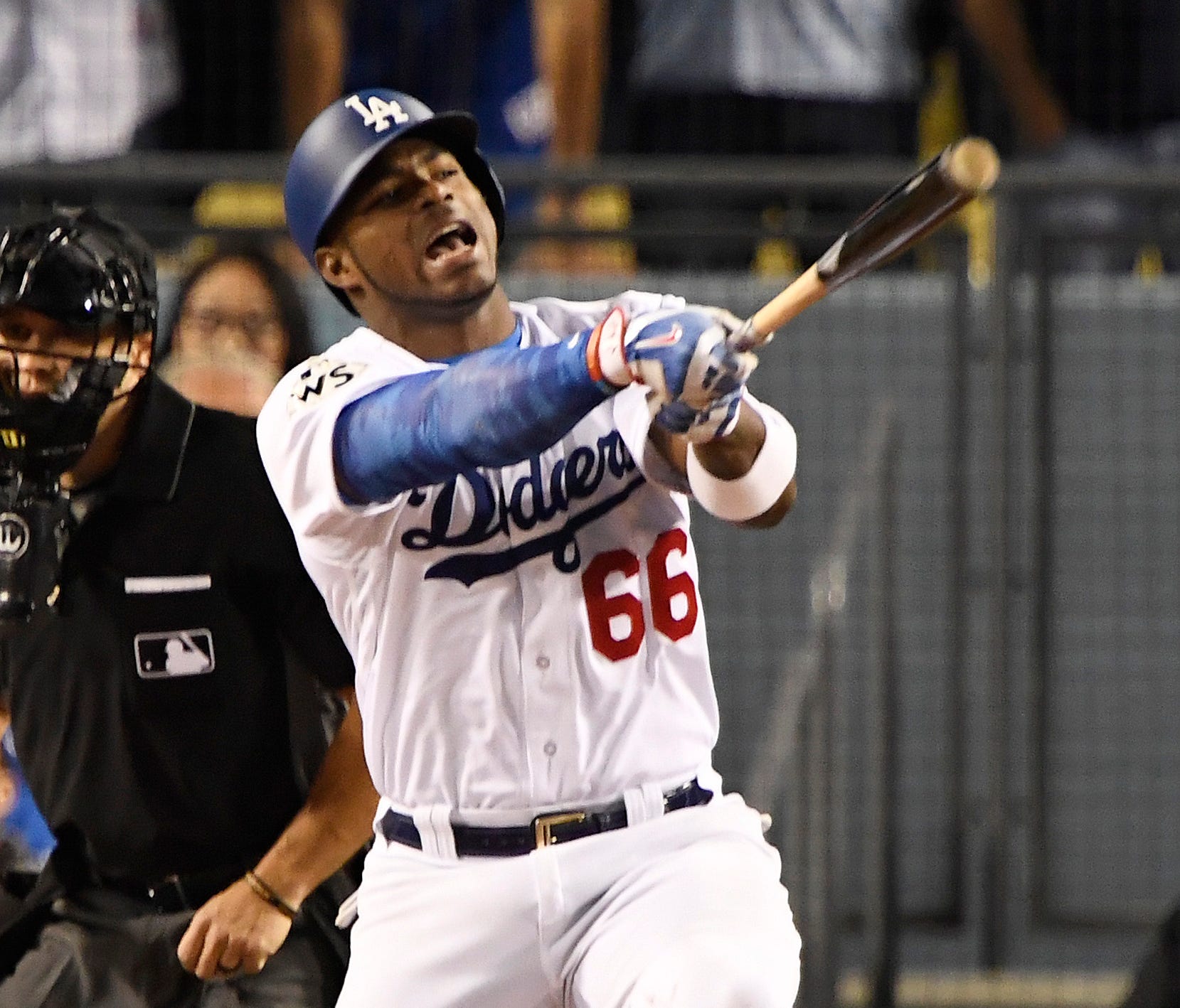 Los Angeles Dodgers right fielder Yasiel Puig (66) reacts at bat in the fifth inning against the Houston Astros in game seven of the 2017 World Series at Dodger Stadium.