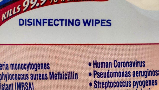 A label on Lysol disinfecting wipes says that their product is 99.9 percent effective in killing the human coronavirus in West Palm Beach, Florida on March 2, 2020.