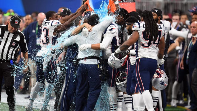 Feb 3, 2019; Atlanta, GA, USA; New England Patriots head coach Bill Belichick is doused with Gatorade after winning Super Bowl LIII against the Los Angeles Rams at Mercedes-Benz Stadium. Mandatory Credit: Christopher Hanewinckel-USA TODAY Sports