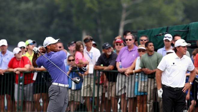 Tiger Woods tees off at hole No. 1 Thursday at Valhalla.
