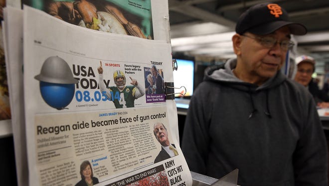 A copy of USA TODAY is displayed at a newsstand Aug. 5 in San Francisco.