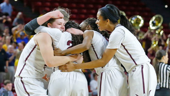 Arizona State Sun Devils celebrates their 57-54 win against Arkansas Little Rock Trojans in their second round of the NCAA Division I Women's Basketball Tournament  game Monday, March 23, 2015 in Tempe, Ariz.