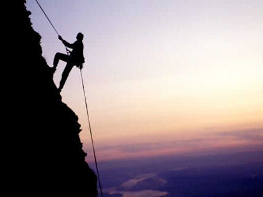 How do mountain climbers retrieve ropes?