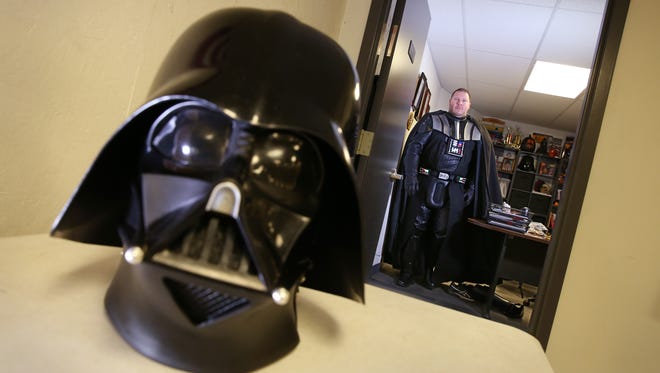 Darth Vader leaves his office at his gym, Allegiant Fitness, in Canandaigua Friday, Dec. 18, 2015.  Vader, 43, legally changed his name from Eric Welch to Darth Vader. 