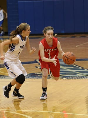 Piketon's Avery Reuter looks to pass as Southeastern's Kali Mitten guards her. Both Reuter and Mitten are among the area's best passers.