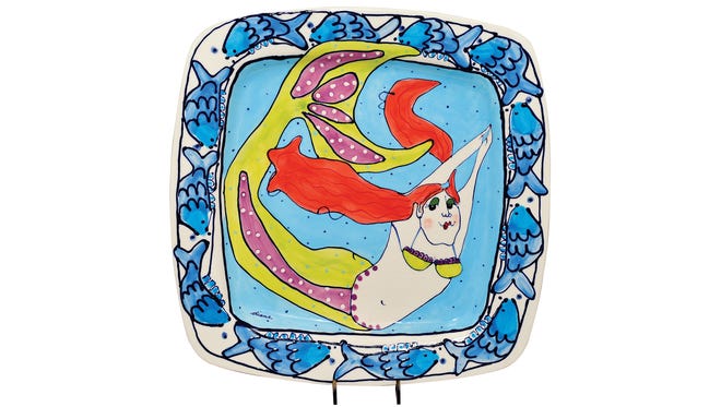 Mermaid stoneware platter,$40.98, at Blue Sky Gift Shoppe. 