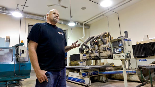 Al Scherping, owner of CNC COPS LLC, Becker, talks Tuesday, July 26, 2016, about the challenges of learning computer numeric control machinist work. While school prepares students for the real world, he's learned many of his skills on the job, he said.