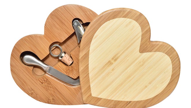 Legacy by PICNICTIME wooden heart cheeseboard with utensils, $54.98, at Blue Sky Gift Shoppe. 
