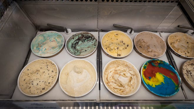 Different flavors if ice cream sit in a freezer inside A Little Something in downtown Port Huron.