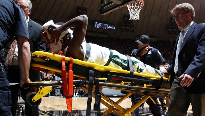 Feb 18, 2017; West Lafayette, IN, USA; Michigan State Spartans guard Eron Harris (14) after injuring a knee is taken off the court on a stretcher during a game against the Purdue Boilermakers at Mackey Arena. Purdue defeats Michigan State 80-63. Mandatory Credit: Brian Spurlock-USA TODAY Sports