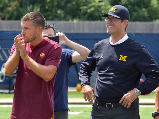 AS Roma midfielder Kevin Strootman and Michigan coach