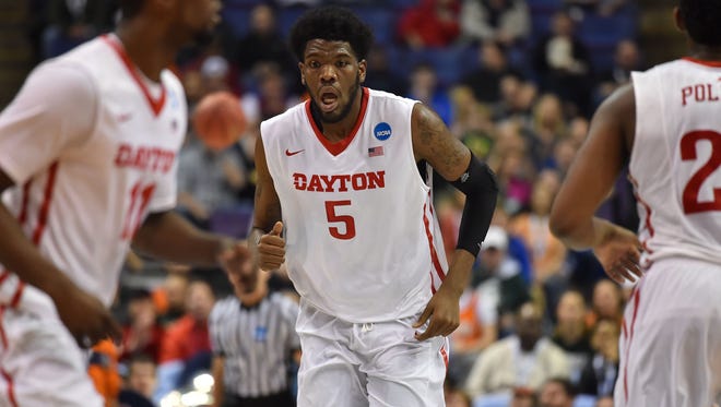 Dayton Flyers center Steve McElvene (5) runs up the court during the first half of the first round against the Syracuse Orange in the 2016 NCAA Tournament at Scottrade Center.