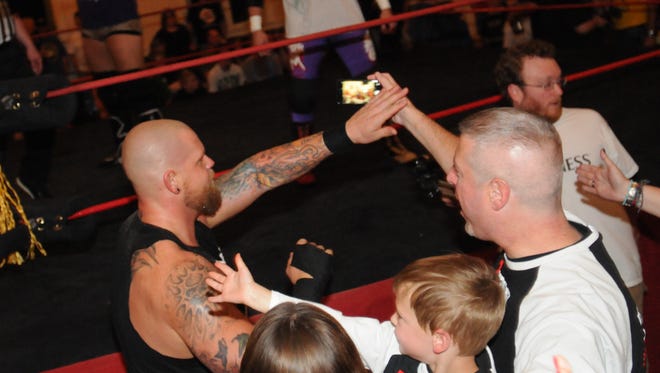 Oshkosh's favorite Son"  Nick Colucci greets the fans before the start of the main event as part of All-Star Championship Wrestling #8, Sponsored by Evil Toy Slades held at the Masonic Center which donation are going to be used for a wheel chair ramp at the Masonic Center.  Seven matches were on the ACW Wisconsin Card June 19, 2015.