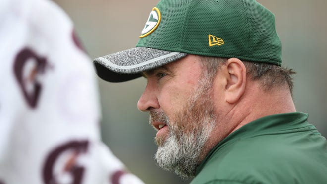 Green Bay Packers coach Mike McCarthy watches during organized team activities May 23, 2017 at Clarke Hinkle Field.