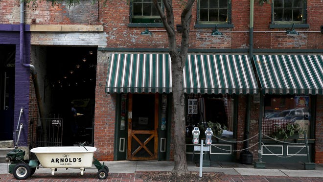 Arnold's Bar & Grill, a historic bar and restaurant in downtown Cincinnati, was targeted by social media hackers, the owner says.