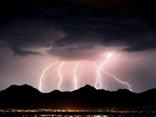 Lightning streaks across the desert sky over the McDowell