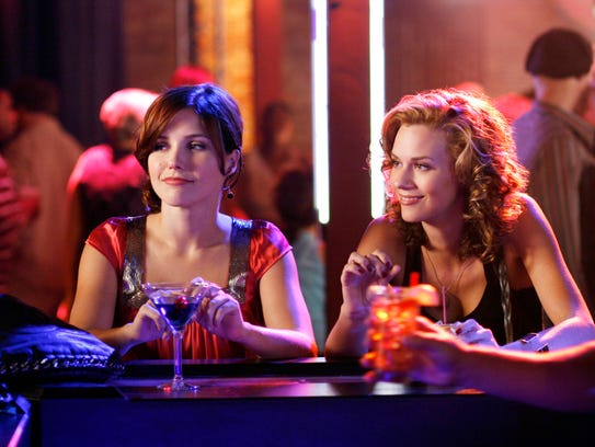 Sophia Bush as Brooke and Hilarie Burton as Peyton