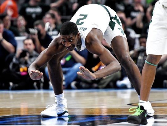 Michigan State's Jaren Jackson Jr. slaps the floor