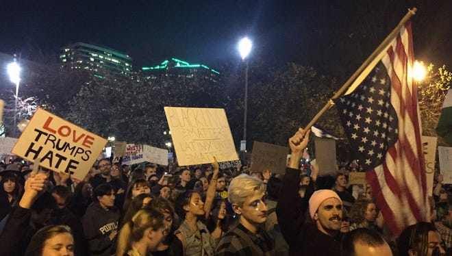Demonstrators in Portland, Ore., march to protest Donald Trump's election on Saturday.