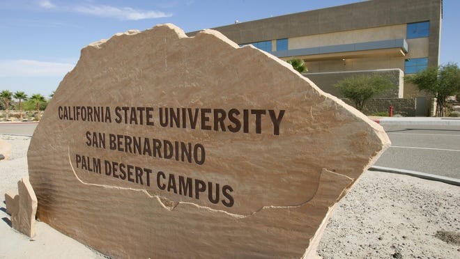 Signage leading to the Palm Desert campus of California State University, San Bernardino.