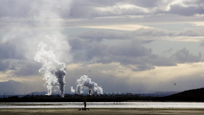 A geothermal power plant on the southern shore of the Salton Sea is visible from Red Hill Bay on Dec. 14, 2012.