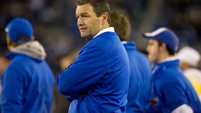 
Kentucky athletic director Mitch Barnhart walks the sidelines during a November 2012 football game at Commonwealth Stadium.
