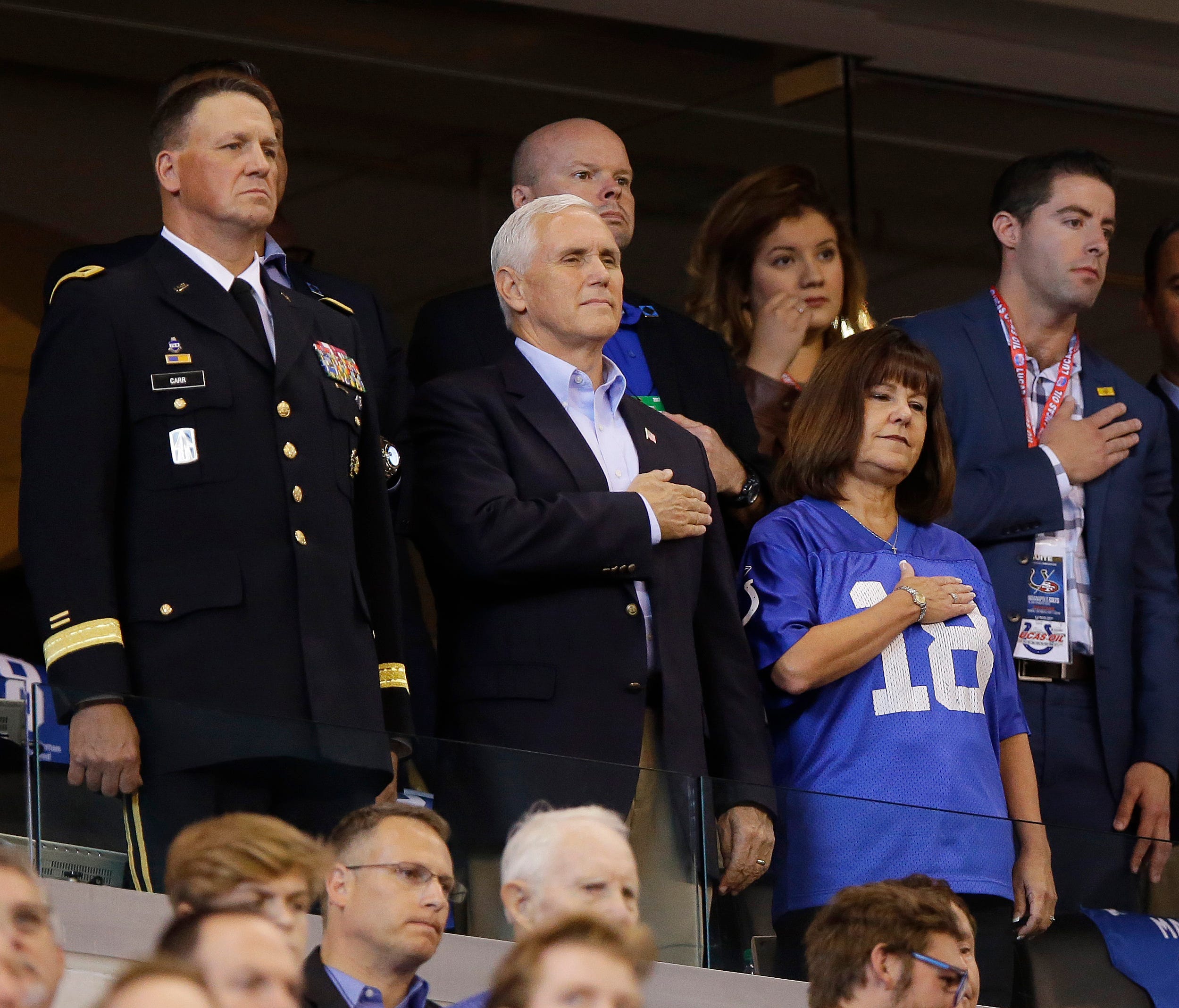 Vice President Mike Pence stands during the playing of the national anthem before an NFL football game between the Indianapolis Colts and the San Francisco 49ers, Sunday, Oct. 8, 2017, in Indianapolis.