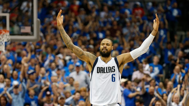 Dallas Mavericks center Tyson Chandler (6) reacts in the second quarter against the Houston Rockets in game three of the first round of the NBA Playoffs at American Airlines Center on April 24, 2015.