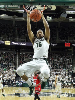 Marvin Clark dunks Saturday against Ohio State. He scored eight points on 4-for-4 shooting.