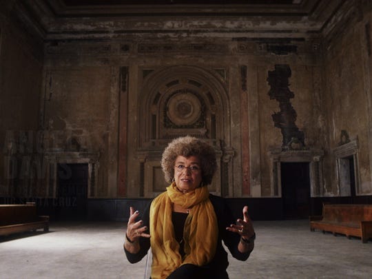 Civil rights activist Angela Davis is interviewed inside an abandoned train station for 'The 13th.'