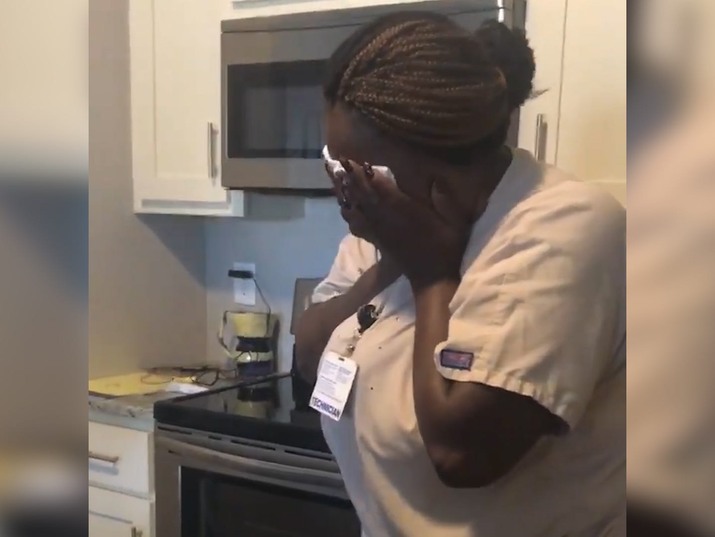 TunDe Hector is surprised with a generous gift.