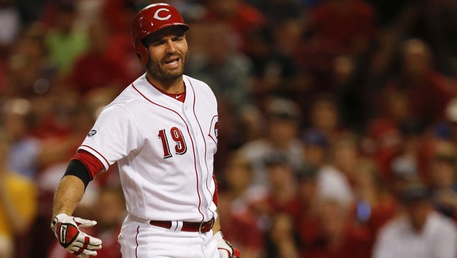 Reds first baseman Joey Votto reacts to a pitch Tuesday against the Cubs.