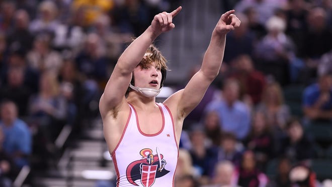 Wrestling State Championships, Day 2, at Boardwalk Hall in Atlantic City on Saturday, March 4, 2017. Robert Howard, of Bergen Catholic, celebrates after defeating Eddie Ventresca, of Pope John, in their 113 pound match. 