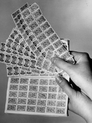 Various trading stamps are seen in this 1965 photo. Many shopper loved to collect the stamps, which could be redeemed for merchandise.