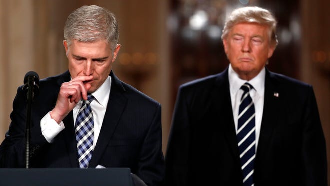 Judge Neil Gorsuch pauses as he speaks in the East Room of the White House in Washington, on Tuesday, Jan. 31, 2017, after President Donald Trump announced Gorsuch as his nominee for the Supreme Court.