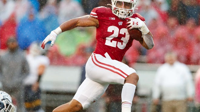 Jonathan Taylor carried the ball 926 times for 6,174 yards during his career at Wisconsin, but might be worth the risk if he is on the board when the Buffalo Bills pick in the second round of the NFL Draft.