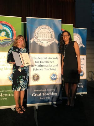 Vicki Willett at the recent awards ceremony, with Dr. Nafeesa Owens, PhD.