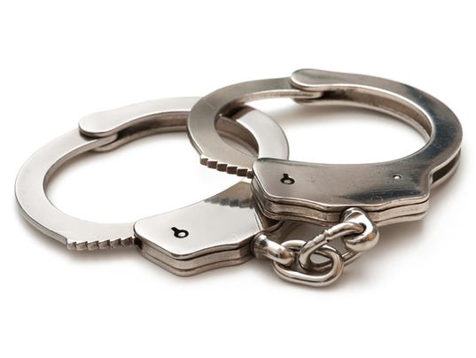 NOT FOR PRINT handcuffs getty images stock crime