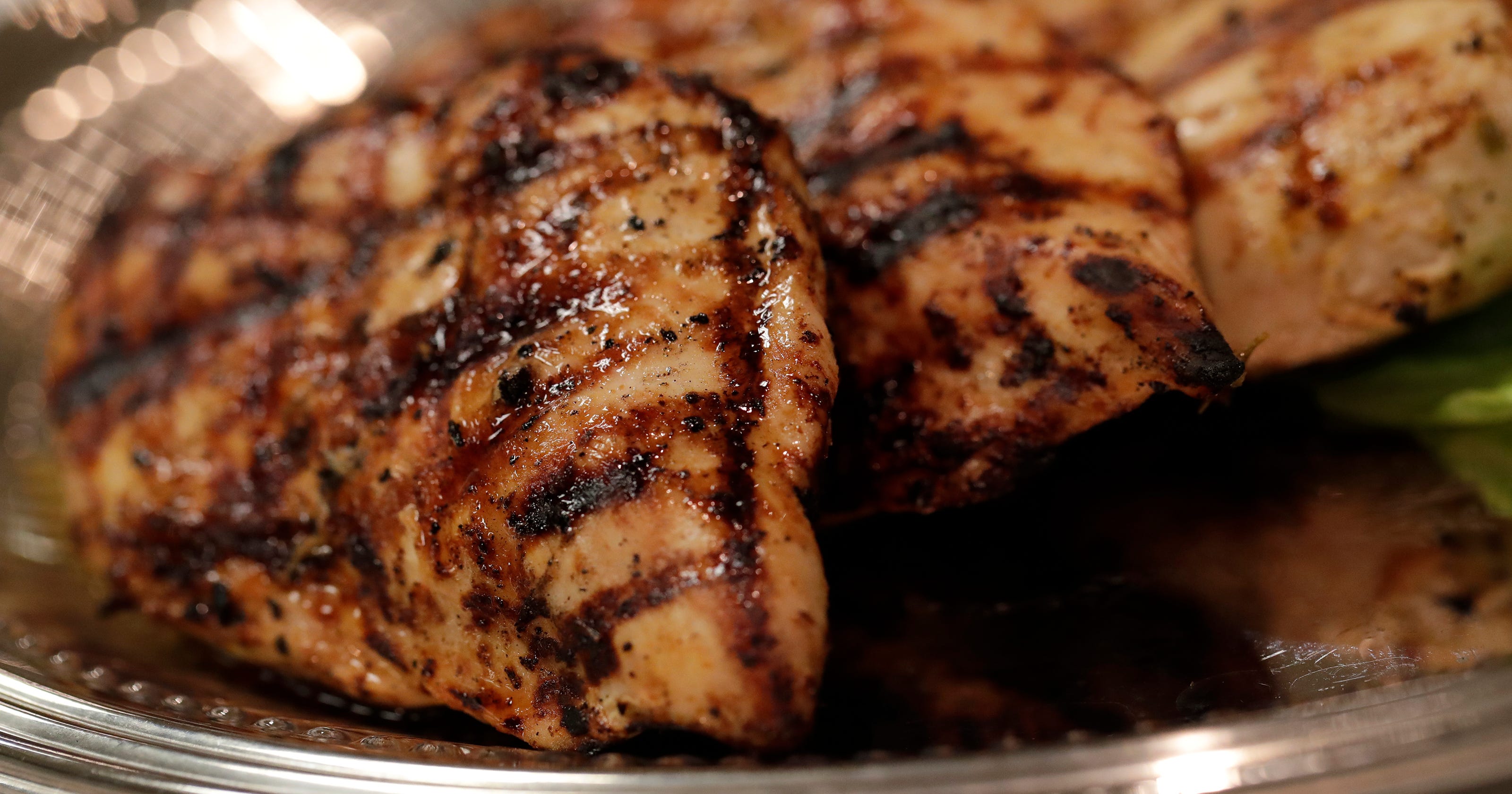 Grilled chicken on a cutting board