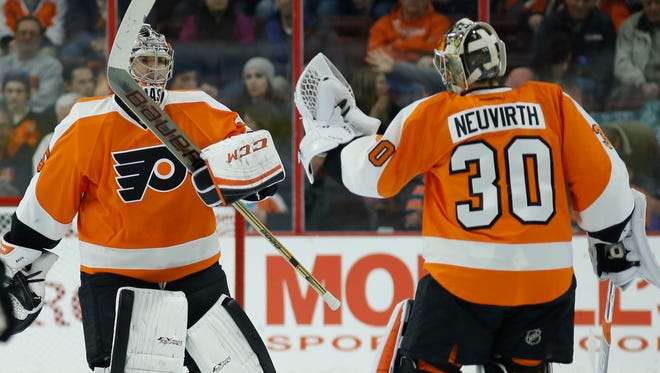 Flyers goalie Steve Mason, left, hasn't been the biggest problem in this series, but Michal Neuvirth may figure in with the season on the line.