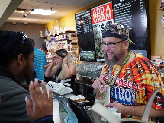 A "budtender" at Denver's Medicine Man marijuana store