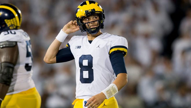 Michigan quarterback John O'Korn plans to play in the NFLPA Bowl Jan. 20 and pursue a career in the pros.