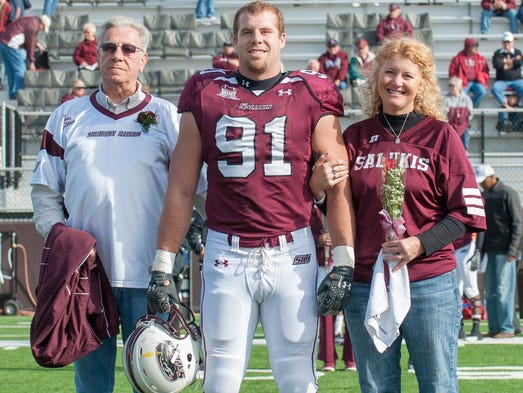 Jason Seaman, center, a Noblesville West Middle School