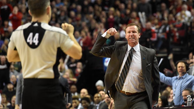 Portland Trail Blazers head coach Terry Stotts is called for a technical foul as he argues a call by referee Eli Roe (44) during the fourth quarter of an NBA basketball game against the Utah Jazz in Portland, Ore., Sunday, Feb. 21, 2016. The Blazers won 115-111.(AP Photo/Steve Dykes)