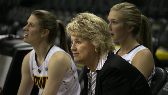 Iowa head coach Lisa Bluder takes a rest from interviews during Iowa women's basketball media day on Thursday, Oct. 29, 2015 in Carver-Hawkeye Arena.